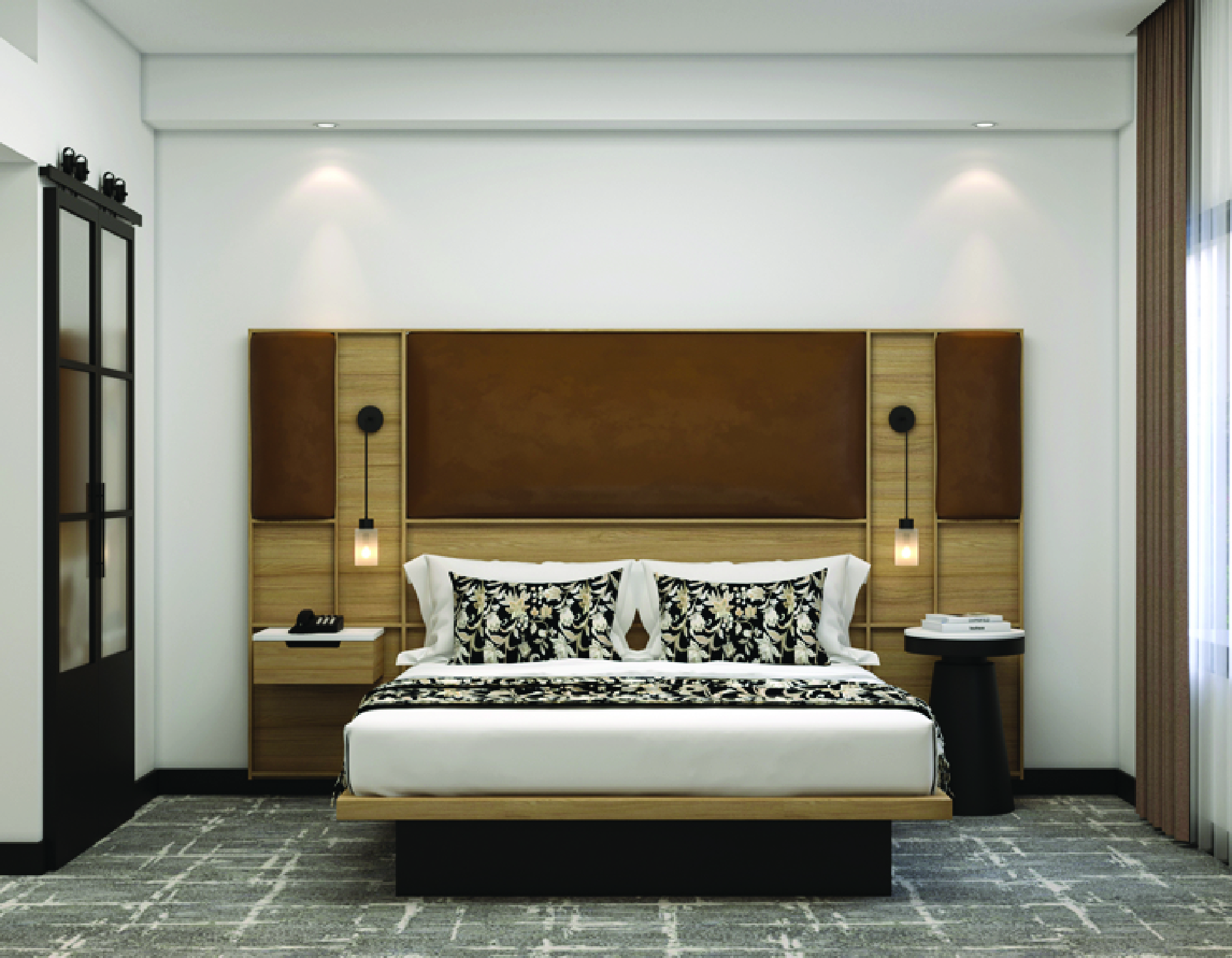 Hotel guest room with upholstered headboard and nightstands
